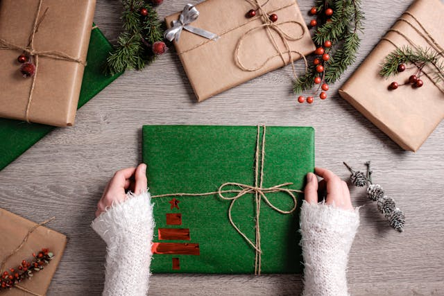 holiday stocking filled with wrapped gifts