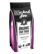 A purple and black bag of Wicked Joe Organic Fair Trade Sumatra coffee. With a craft roasted seal.