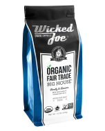 A black and cobalt blue bag of organic fair trade coffee.